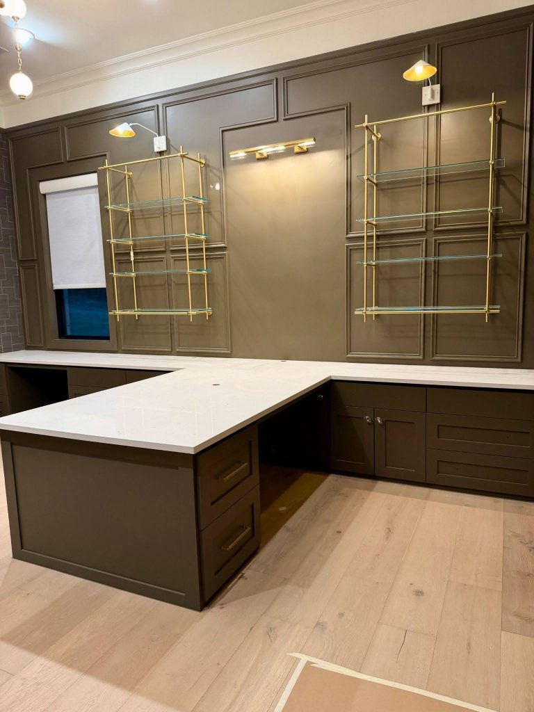 Home office design with custom built ins