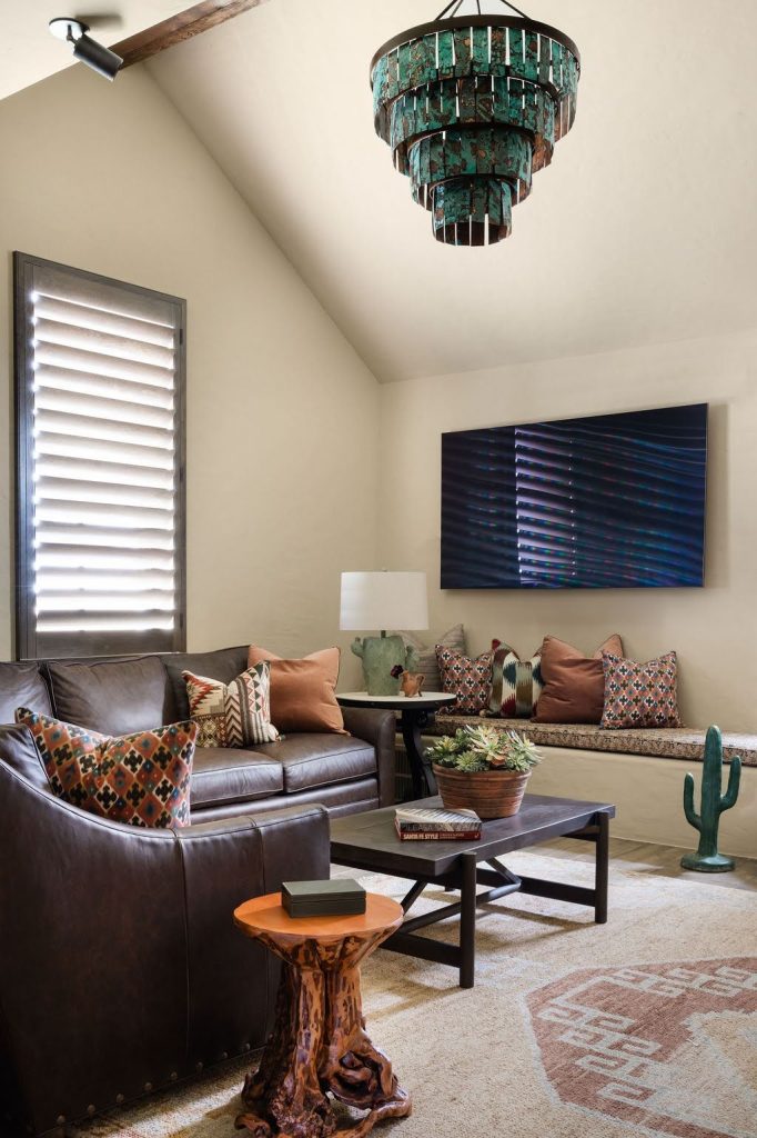 Custom home living space with vintage furnishings and layered textures