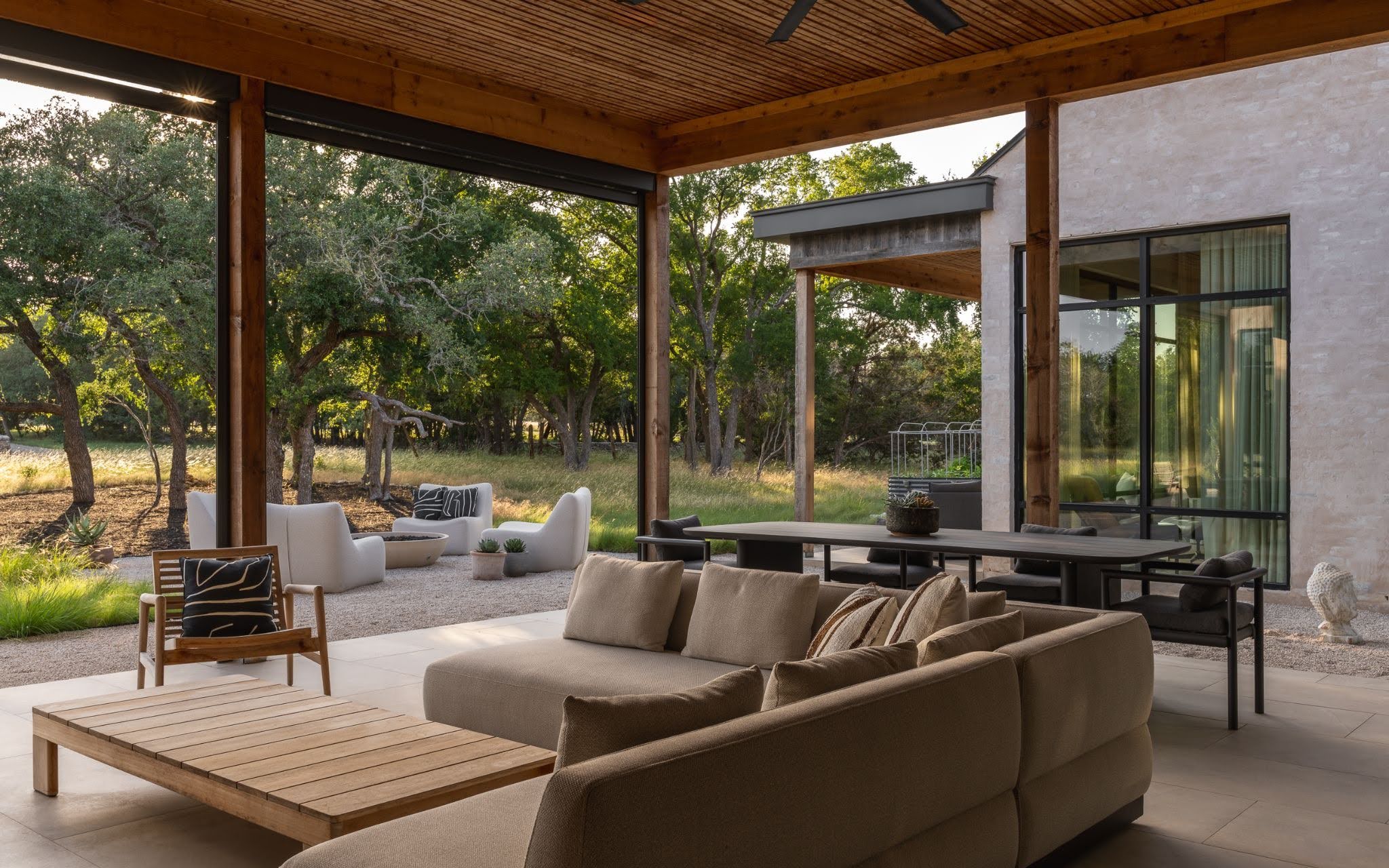 Covered patio showcasing custom home design and natural surroundings